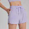 Поддельные два куска спортивных шорт Женские против бликов с высокой талией брюки для йоги свободны и подирают спортивные беговые брюки лето