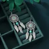 Charm New Bohemian style turquoise feather hollow earrings and earrings