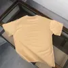 Yaz Mens T-Shirt Tasarımcı T-Shirt Erkek Kadın Göğüs Mektubu Baskı Grafik Tee Saf Pamuk Kısa Kollu Üst Pullu Gömlek Tees Asya Boyutu M-3XL