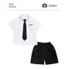 Vêtements Ensembles adolescents garçons Été Set Children's Wear Thin 2024 Beau style britannique Boy Blanc Coton Coton Shirt à manches courtes Shorts noirs Tie