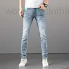 Jeans designer maschile jeans primavera/estate jeans slim fit piccoli piedi perforati pantaloni per gamba dritta elastica elastica oi2w