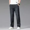 Męskie dżinsy Summer Thin dżinsy męskie luźne proste spodnie moda elastyczna talia stretch bawełna biznes swobodny dżinsowe spodnie jasnoniebieskie Y240507