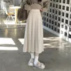 Jupes coréense de mode coréen jupe plissée femmes 2024 dos élastique haute taille longue femme preppy style une ligne école femme