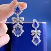 Boucles d'oreilles en peluche Keepigo S925 Sterling Silver Sapphire High Carbon Diamond Tanzanite Pendre de gouttes d'eau Sparkling Party Fine Bijoux