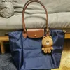 Brand Brand Brand Brand Brand Borsa in pelle di lusso in tela ricamata in tela ginnante con tela da gocce di tela a spalla singola per pendolare di grande capacità Tote8pz2