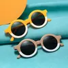 Zonnebrillen Nieuwe Elden zonnebril Koreaanse editie meisjes ronde frame zonnebril gepersonaliseerde baby zonnebril mode -editie H240508