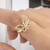 Anelli a grappolo rakol Luxury Hollo Cavo Fly Ruota per donne squisite anello di colore in oro zircone lucido abbigliamento quotidiano gioielli