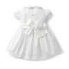 Robes de baptême bébé fille blanche à la main