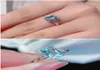 Cluster anneaux mode bleu cristal aquamarine topaze griets diamants pour femmes en or blanc argenté bijoux bijouterie Bijoux cadeau823363
