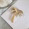 Merkontwerper Nieuwe kokosboomvormige broche luxueuze 18K vergulde modieuze veelzijdige veelzijdige broche hoogwaardige sieraden charmante vrouwen hoogwaardige broche box