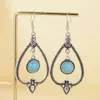 Charm Ethnic style earrings with turquoise hollow pattern Chinese style bohemian earrings