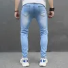 Jeans masculinos primavera strt estilo homens orifícios magros calças de jeans machos machos machos angustiados mendigos casuais calças de jeans y240507