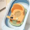 Les baignoires des sièges d'un affichage numérique de détection de température pour les sièges de baignoire pour enfants.Un siège de baignoire assis avec un jouet à balle conforme à l'ergonomie WX