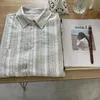 T-shirt féminin 2024 Chemise à rayures rétro pour femmes coréennes à manches longues à manches longues Bureau des femmes décontractées