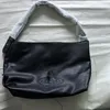 Märke Saturn Tote Bag Vintage Black Leather Bag Hobo stor kapacitet Crossbody Bag