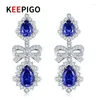 Boucles d'oreilles en peluche Keepigo S925 Sterling Silver Sapphire High Carbon Diamond Tanzanite Pendre de gouttes d'eau Sparkling Party Fine Bijoux