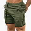 Shorts maschile uomini cortometraggi di fitness palestre estive allenamento maschio in maglia traspirante pantaloncini sportivi a secco veloce pantaloni corti pantaloni per uomini y240507