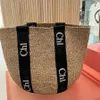 Livraison gratuite Sac de plage en fourreau de paille ch chouetter panier de panier de concepteur de luxe Crochet tissage boutique épaule craquette crossbody bownkknot populaire