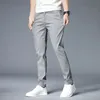 Wiosenne lato swobodne spodnie Mężczyźni cienki rozciąganie Slim Fit Business Business Klasyczne koreańskie spodnie Mężczyzna Khaki Gray 38 240507