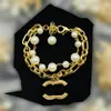 Pulseira clássica Mulheres 18K Gold titânio aço de aço de cristal flor amantes de pérolas presentes jóias de designer de punho de punho de punho