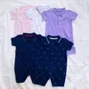 Ontwerper Baby Rompers Polo jumpsuits Polo Jumpsuits Boy Girl Kinderen Pure katoenen roze witte paarse kleding 0-2 jaar oud kinderkleding