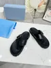 Designer Sandals Uomini Donne Polli Slide Slide comfort piatto pantofole per muli in rilievo cursore femminile Nylon Cool Slide 0504