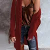 Tricots des femmes Femme Faut Hiver Elegant Mid-Longle Sweater Tendance de mode décontractée Veste en tricot 2024 Cardigan à manches longues irrégulières
