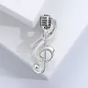 Broches -stijl elegante muzieknoot microfoon borstpen veelzijdige trui jas eenvoudige bloem high -grade accessoires