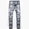 Jeans masculin New Spring Mens Ripped Hole Jeans décontracté slim fit gris jean pantalon masculin Hip Hop Denim Pantalon Straight Pantnes Hombre T240507