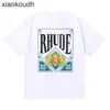 Rhude High End Designer Roupos para manga curta High Street Fashion Summer Men and Women Gênero Cartões grátis Impresso Caminhadas de algodão solto Moda com 1: 1 Rótulo original