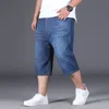 Grande taille 2848 50 jeans shorts en jean pour hommes 150 kg lâches d'été mince gras faste moelle de mode de mode à cinq longs pantalons 240423