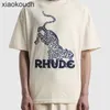 Rhude high end designer kläder för leopard tryck high street mode lös rund nacke kort hylsa t-shirt sommarmän och kvinnor med 1: 1 original etiketter