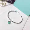 Chaîne Love Enamel T Famille Bracelet de perle ronde argent pur avec un cadeau de mode haut de gamme classique en forme de cœur pour les femmes Q240507
