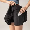 Jupes Skorts 2024 Nylon Pocket Gym Running Pleed Tennis Yoga Jirts Women Sports Fitness Anti Shorts High Waist Tennis Jirts D240508