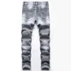 Jeans masculin New Spring Mens Ripped Hole Jeans décontracté slim fit gris jean pantalon masculin Hip Hop Denim Pantalon Straight Pantnes Hombre T240507