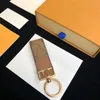 Projektantka odkurzacza wielokolorowa luksusowa brelok Kobiety mężczyźni brązowe skórzane torebki torebki smyczowe złoto platowane akcesoria z literą top20