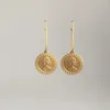 Boucles d'oreilles en pente à la mode de couleur ordage de couleur de monnaie