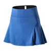 Jupes skorts femmes sports jupe courte de couleur solide jupe de tennis de fitness doublé de jupe de gymnase anti-lumière de gymnase