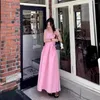 Casual klänningar kvinnor rosa ärmlös båge slips lös klänning elegant fast färg backless 2024 sommar fransk stil sexig fest