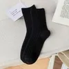 Frauen Socken 2024 Est Winter verdicken Kaschmirwolle lässig Modische modische Farbe Lange Mädchen Wärme warme Crew Socke