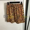 Jupe léopard Ensemble de mode imprimement à manches courtes t-shirts élastiques mini robes de taille pour femmes punk d'été robe