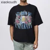 Rhude High End Designer Vêtements pour lettre florale Impression de t-shirt à manches courtes en vrac à manches en vrac à la mode à la mode pour hommes et femmes avec des étiquettes originales de 1: 1