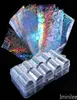 10pcsbox Holographic Nail Art Foils Snowflake Unicorn Transparent AB Tips de transfert de couleur Autocollants Décoration Wrap Manucure1423229