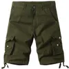 Avec des vêtements de travail plusieurs poches, des shorts de plage de 5 pouces de camouflage surdimensionnés et un short