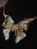 Ketens westerse antieke ontwerpontwerper vintage vlinder ketting vol met diamanten qingdao oude zware industrie