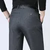 Pantalon masculin Fashion haute taille bouton lâche poches de ferme