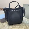 Bolsas de designer de luxo Mulheres sacolas de compras pretas grandes grandes bolsas grandes letra correta bolsa de ombro de ombro bola clássica bolsas clássicas