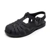 Jongensmeisjes baby casual plastic peuter schoenen sandalen lente en zomerse kinderen zachte bodem teen plat holle gat 240506