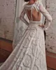 Robes de mariée de robe unique en dentelle à manches longues à manches détachables de corsage de corsage de balayage à glissière