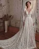 Robes de mariée de robe unique en dentelle à manches longues à manches détachables de corsage de corsage de balayage à glissière